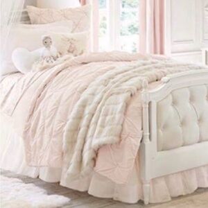 Elegant pink comforter by Monique Lluillier